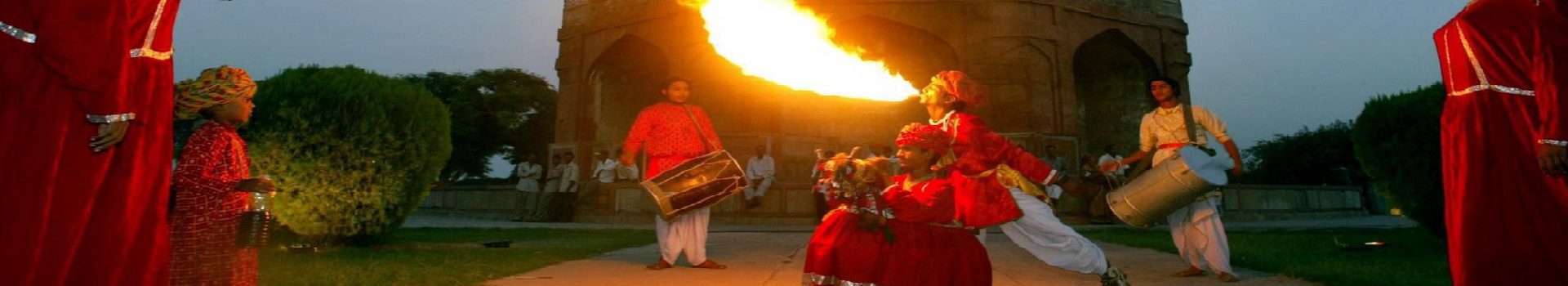 Folk artists dressed in traditional Rajasthani state attire perform at an event to celebrate World Tourism Day at the Old Fort complex in New Delhi, India, Monday, Sept. 27, 2004. (AP Photo/Gurinder Osan)